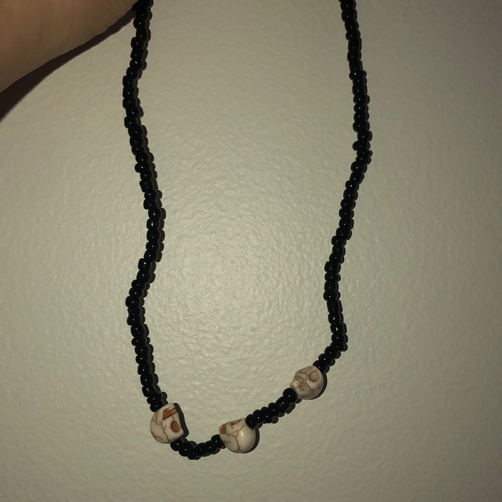 black necklace with skull beads